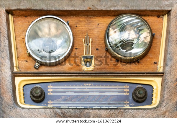 Old radio and car\
lights as interior design