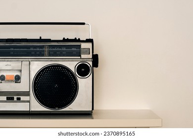 Old radio cassette background. Eighties music on portable radio. Image for music poster design - Powered by Shutterstock