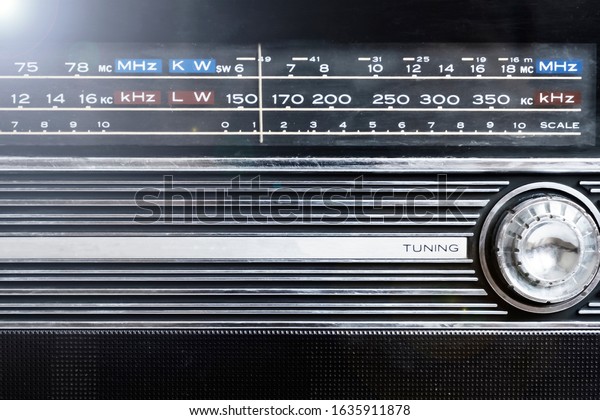 An old radio frequency\
tuning in abstract style. Retro background. Retro music concept.\
Music radio sound wave. Classic vintage design. Radio station\
signal.