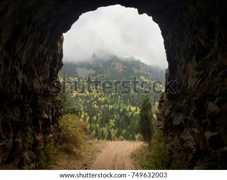 An old railroad tunnel on Gold Camp Road leading to Cripple Creek, Colorado in Pike National Forest near Pikes Peak.