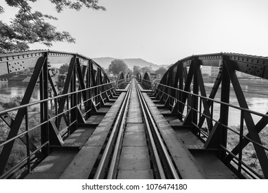old railway bridge across a river