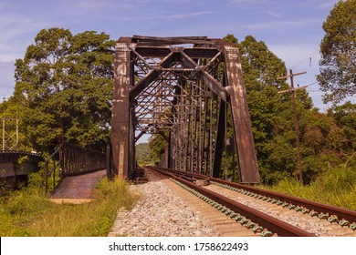 The Old Railway Bridge Is Made Of Steel For Over 70 Years, Rust And Dirty. Located In Southeast Asia