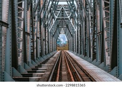 Old railway iron bridge in countryside at Ban Dara, Pichai District, Uttaradit, Thailand. Name is Paramin Bridge also known as Baan Dara Bridge It is a railway bridge over the Nan River - Powered by Shutterstock