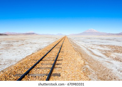 Old railway in Salar de Uyuni (salt flat), Bolivia - Shutterstock ID 670983331