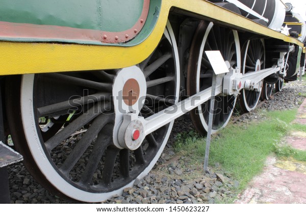 Old\
Railway wagon\'s Wheels in display on rail\
track.