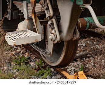 An old railway wheel with a rusty look