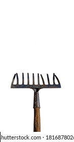 Old Rake On White Background. Decorative Concept