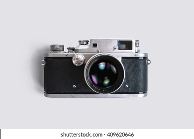 Old rangefinder camera on white background. Vintage style