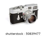 Old rangefinder vintage camera on white background
