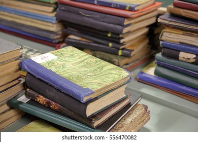 Old Rare Books With Different Bindings In The Stack