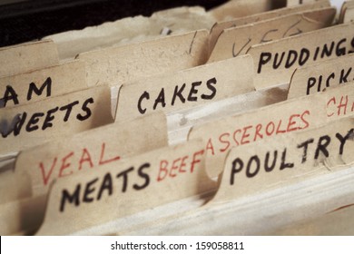 Old recipe box, with sections for cakes, meats, etc.  