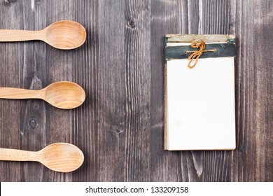 Old Recipe Notebook, Spoons On Wood Background