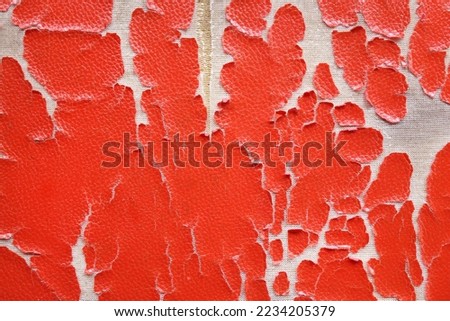 Old red artificial leather damaged or tear or damage leather surface texture background