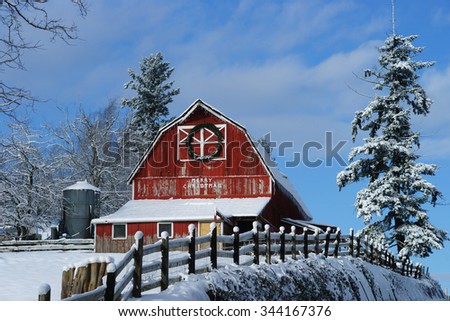 Old red barn in the snow.