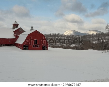 Old red barn in winter