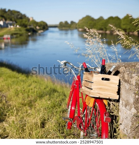 Similar – Image, Stock Photo Red bicycle luggage rack and rear light