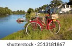 The old red bike of a winemaker on the banks of the Loire in France.