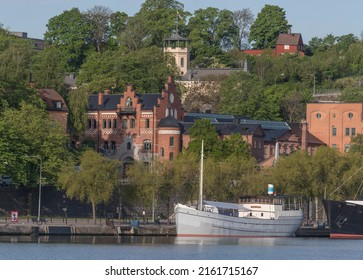 A Old Red Brick Brewery Building At The Bay Riddarfjärden With Boats A Sunny Day In Stockholm, Sweden 2022-05-26