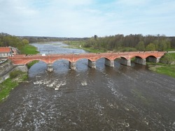 The Old Red Brick Bridge Across The Venta River. Kuldiga, Latvia