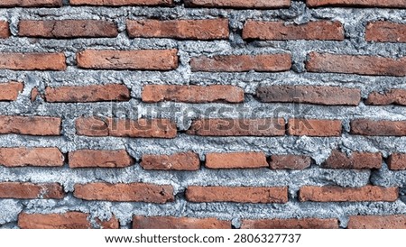 Old Red Brick Wall Texture with Rough Cement Mortar Background