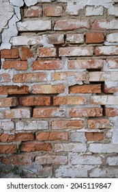Old red brickwork. The whitewash that has come down has exposed the brickwork