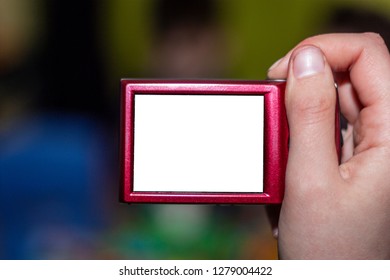 old red camera with blurred background. clean white display