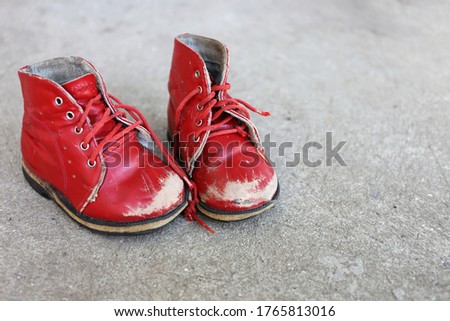 old red children pair of leisure boots