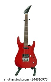 The Old Red Electric Guitar On A Stand Against The Backdrop Of White