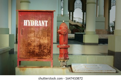 Old Red Fire Hydrant outside the mosque area.                             