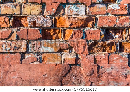 old red grunge brick wall background or texture