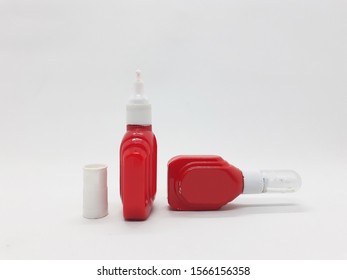 Old Red Packaging of Liquid Correction Pen for Office and School Supplies to Correct Document Writing in White Isolated Background