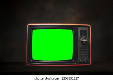 Old Red Retro TV It's Still Life With Green Screen In Dark Room