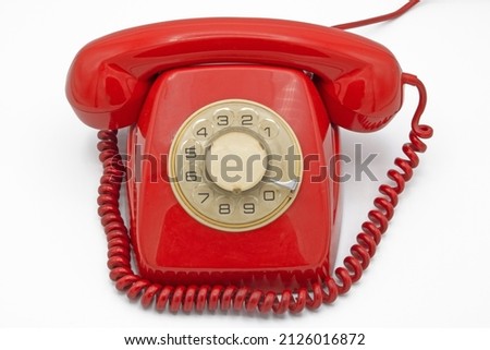 Similar – An old red telephone over red background