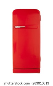 Old red vintage refrigerator isolated on white background