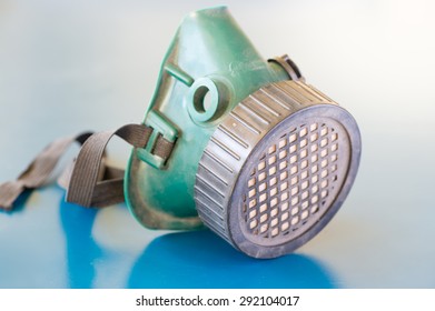 Old Respiratory Protection On Blue Background