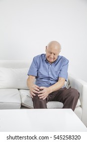 Old Retired Gentleman With Chronic Knee Problems And Pain