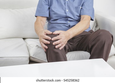 Old retired gentleman with chronic knee problems and pain