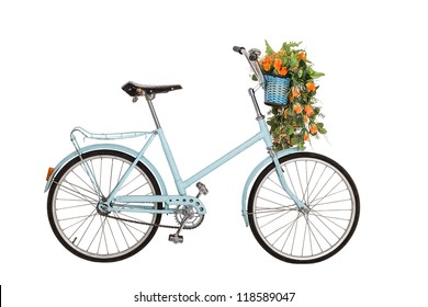 Old retro blue bicycle with flowers bouquet in basket isolated on white background - Powered by Shutterstock