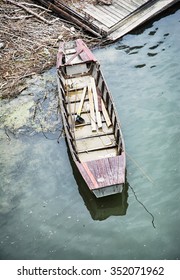 Old Retro Boat In The Water, Near The Shore. View From Above.