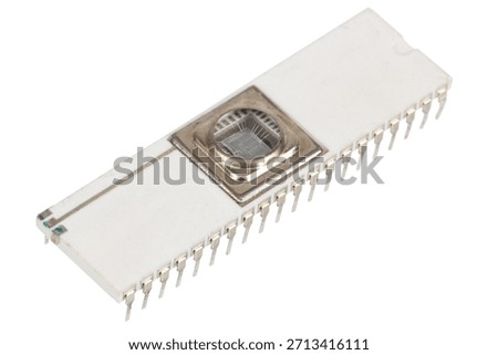 Old retro CPU microchip processor on white background.