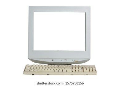 Old retro CRT monitor display with blank white screen and a keyboard isolated on white background.