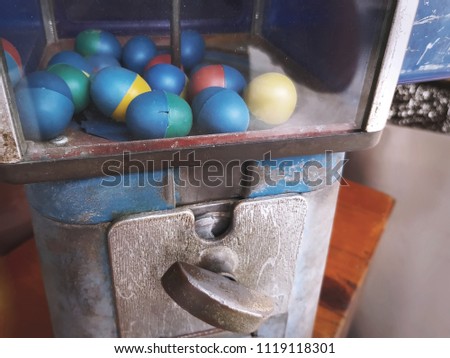 Old Retro Dispensing Unit of Plastic Eggs Toy