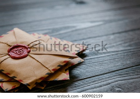 Similar – Image, Stock Photo Old paper envelopes over wood texture