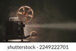 Old retro film projector light beam in the dark