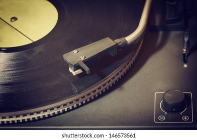 Old Retro Record Player With Vinyl Disk.