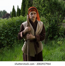 Old retro rural muslim cultur young male worker think face lamb sheep cattl nature grass herd stand. East asian arab ethnic robe cloth jew good Lord Jesus Christ God arm holy gospel pray story concept