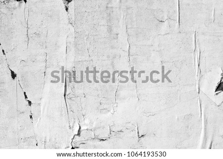 Old ripped torn grunge posters texture background creased crumpled blank paper backdrop placard surface empty blank space for text