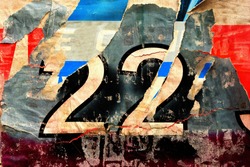Old ripped torn posters grunge texture background creased crumpled paper backdrop placard surface urban street posters number 22, a Background Photo by Cafe Racer