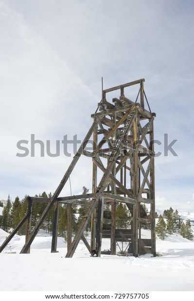 The old Robert Emmet mine headframe\
still stands, overlooking the mining district of Leadville,\
Colorado.  This particular mine shaft is 800 feet\
deep.