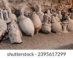 Old roman amphoras pottery were used as storage and transport vessels for olives, cereal, oil, and wine by the greeks and romans.